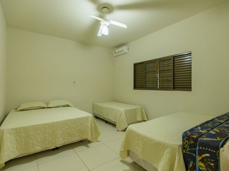 Suíte climatizada com camas para a família